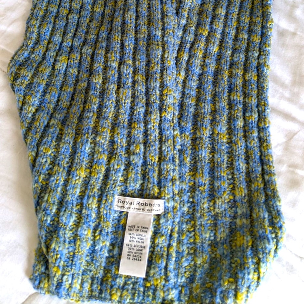 Previously owned woman’s scarf in excellent condition